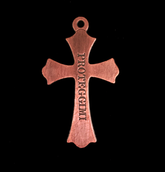 cross shaped copper charm, with the word 