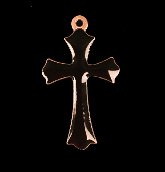 copper cross shaped charm with the word 