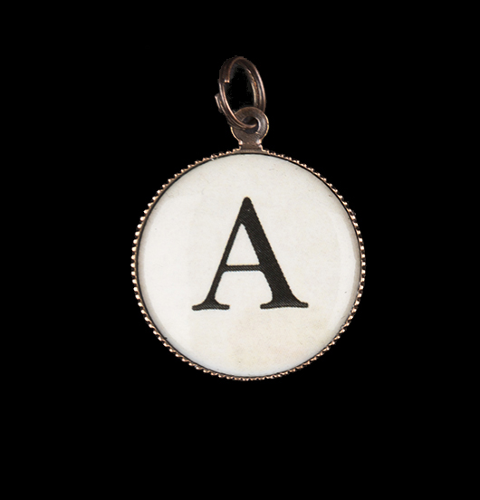 Letter A of the alphabet, pendant in porcelain, idea for a customized jewel. Initial for a necklace, a bracelet, a unique jewel.