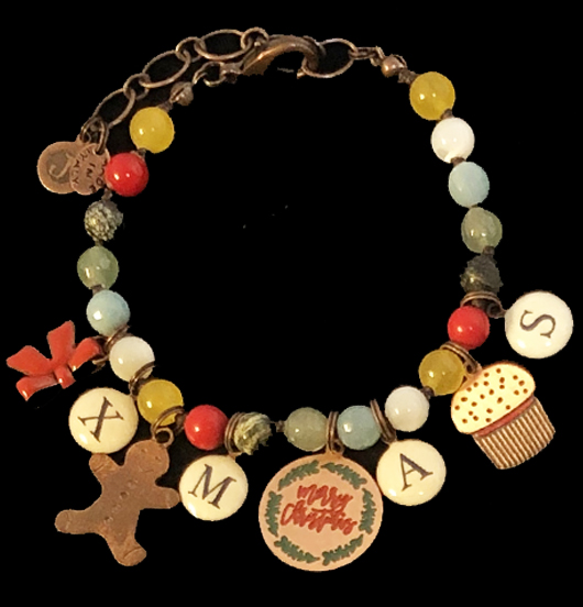 Red stone bracelet with copper and porcelain medals, and also crystals and a mother of pearl stone.